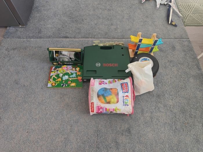 mixed toys blocks, hot wheels, work table
