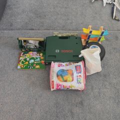 mixed toys blocks, hot wheels, work table