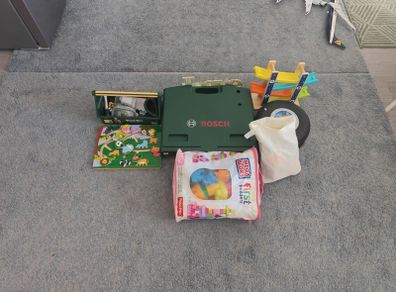 mixed toys blocks, hot wheels, work table