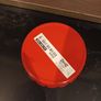 Red pillar candle & plate Image 6