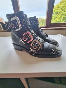 Studded black ankle boots with buckles