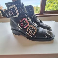 Studded black ankle boots with buckles