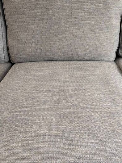 IKEA KIVIK 3-seater sofa with chaise in dark grey.