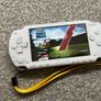 Modded Sony White PSP 1000 with Over 100 Games with Case and Charger. Image 3