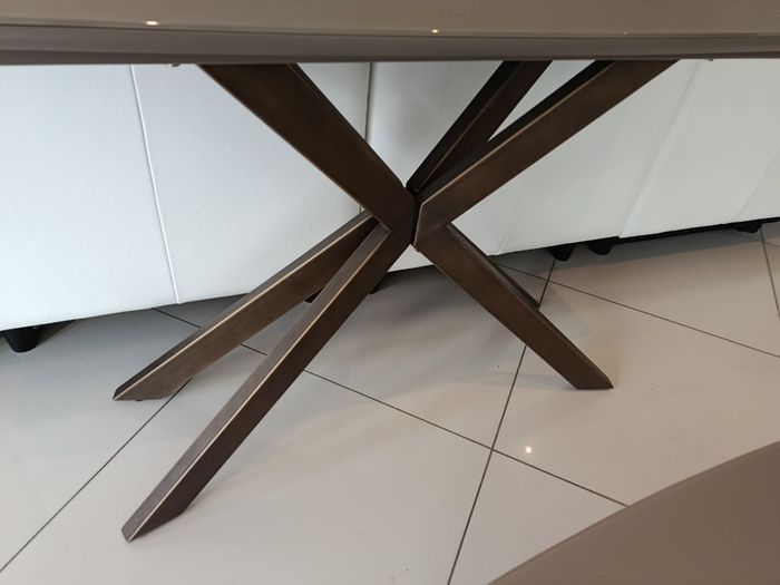 Coffee table from Eazy Living, brown glass top