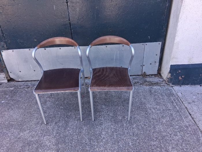 Pair of Piuma occasional chairs designed by Origlia