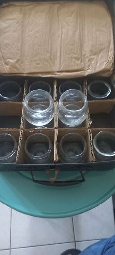vintage set of 12 jars in lovely leather carry case