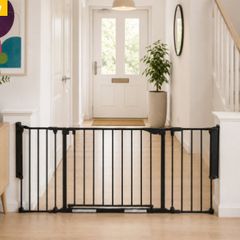 Black metal fire guard and safety gate