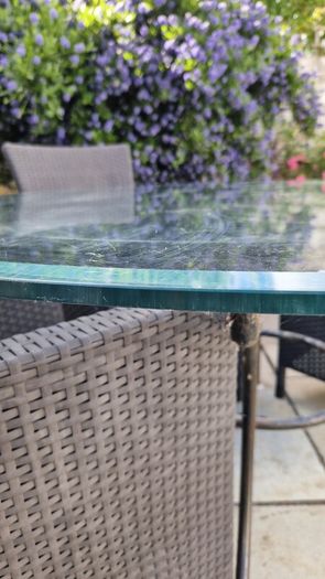 Glass top garden table