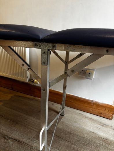 Massage table