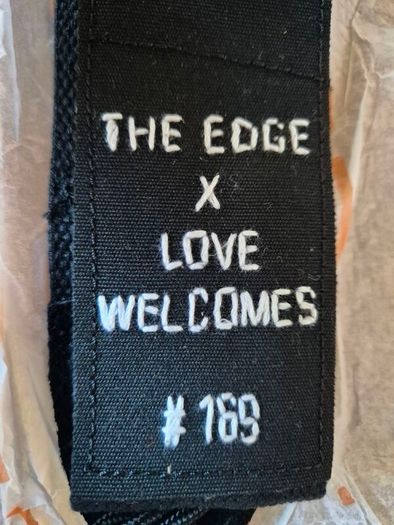 Edge U2 Love Welcomes Guitar Strap with signed card,  brand new numbered put of 500