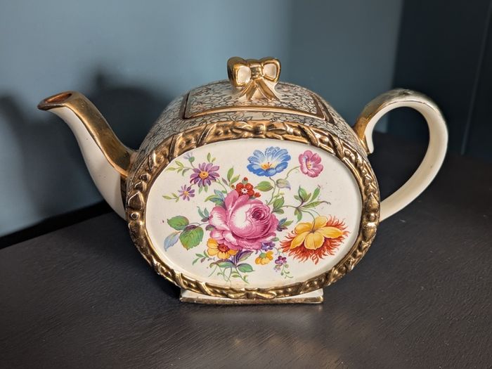 Vintage floral teapot with gold trim