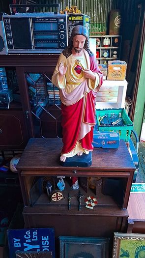Antique holy statue and pictures