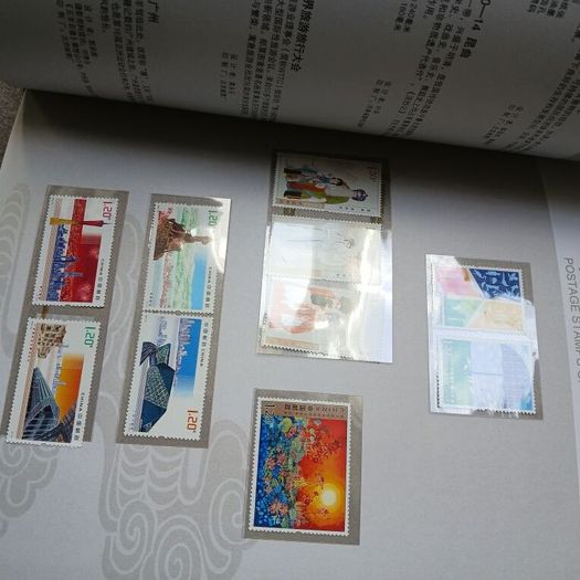 China Stamps. Mint. Full set of 2010 stamps. All untouched.  Book and sleeve undamaged and not used.
