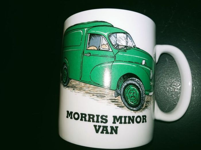 collection of six automotive mugs