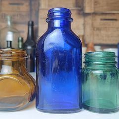 455 - Set of Three Beautiful Vintage Glass Decorative Collectible Bottles - Amber Eire Bovril, Cobalt Blue Magnesia and Turquoise Science Cream