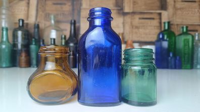 455 - Set of Three Beautiful Vintage Glass Decorative Collectible Bottles - Amber Eire Bovril, Cobalt Blue Magnesia and Turquoise Science Cream