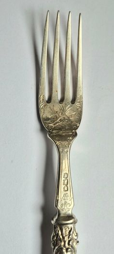 Sterling silver Fork, 1901, fully silver inc prongs. Intricate decoration.