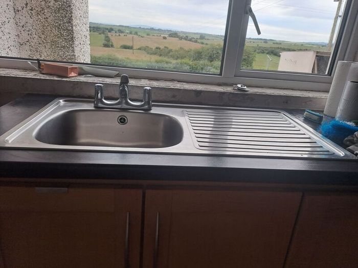 kitchen sink with taps