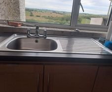 kitchen sink with taps
