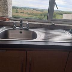 kitchen sink with taps