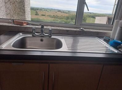 kitchen sink with taps