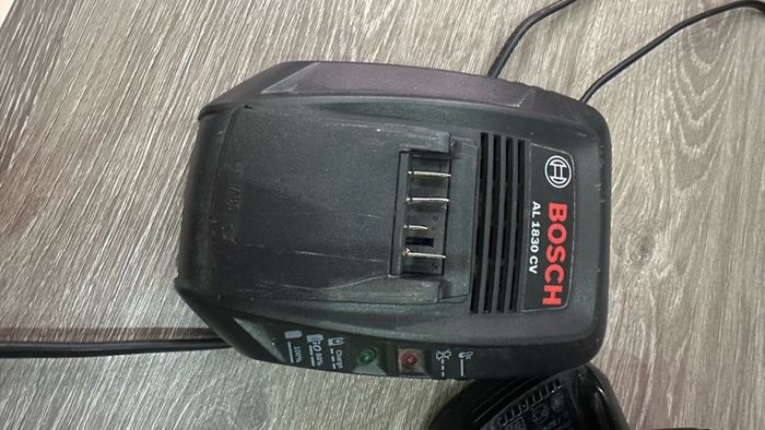 2 Bosch 18V 2.5 Ah Batteries with Charger.