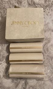 Jimmy Choo glass case.