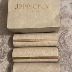 Jimmy Choo glass case.