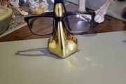 Eye glasses stand brass