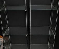 Two Detolf Ikea glass display cabinets