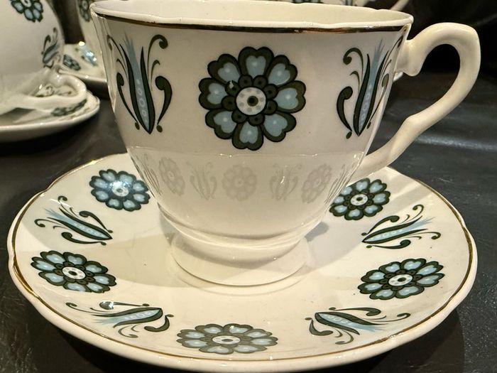 Mayfair Bone China 4 Cups & 5 Saucers and jug.
