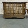 Large Victorian cane and metal laundry basket on wheels. Image 3