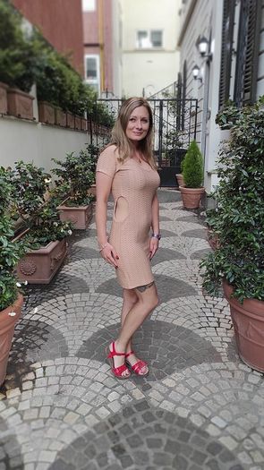 Beige dress with cutouts
