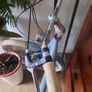 This is a B'TWIN Elops city bike, a fully-equipped urban commuter in a light blue color. Image 3