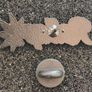 Roll up ,  pin back badge. Image 2