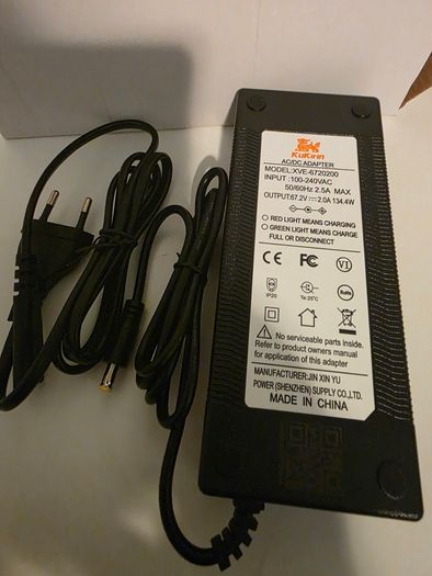 Kukirin G4, the original battery charger .
