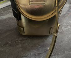 Juicy Couture gold handbag