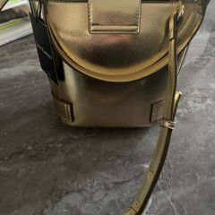 Juicy Couture gold handbag