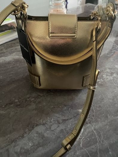 Juicy Couture gold handbag