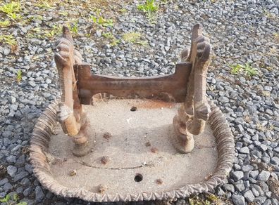 antique foot scraper. cast iron.