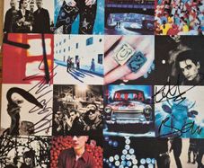 U2 Achtung Baby original pressing Promo vinyl  signed by Bono, Edge and Adam