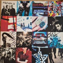 U2 Achtung Baby original pressing Promo vinyl  signed by Bono, Edge and Adam