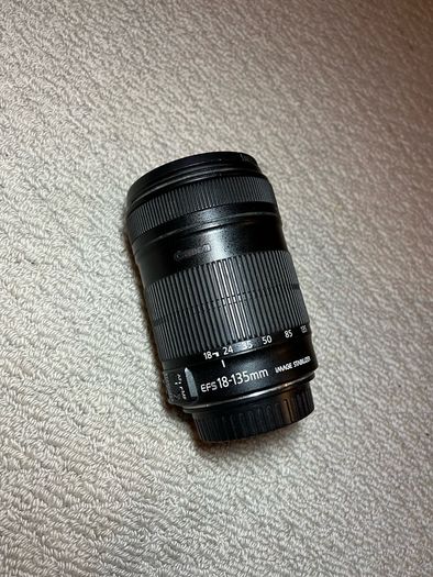 Canon 100D DSLR Camera and Canon EF-S 18-135mm IS Lens