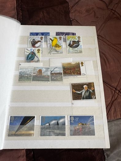 Mint UK album with stamps