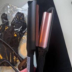New hair curling iron