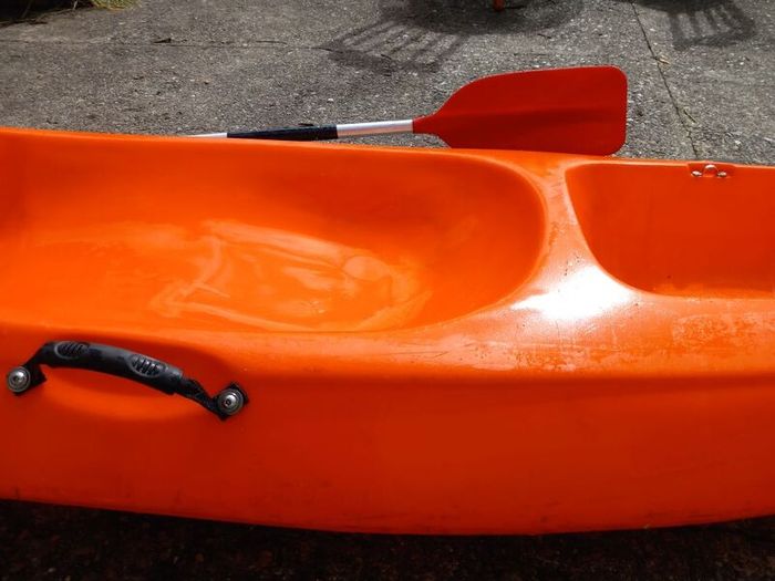 Kayak plus 2 paddles and 2 bouyancy aides