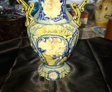 Antique Majolica Vase featuring ornate double handles, Postage Available