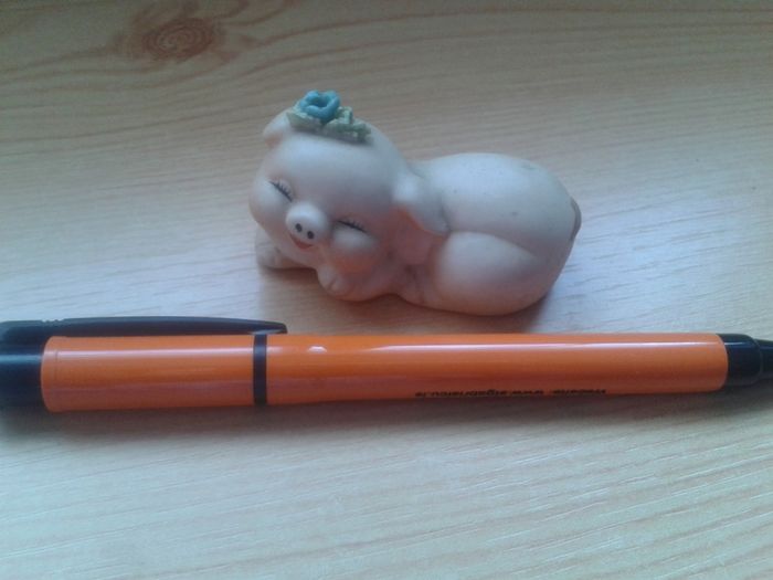 Sleepy little pig ornament