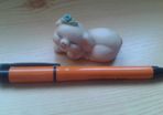 Sleepy little pig ornament